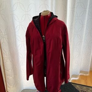 Reversible red and navy polka dot raincoat